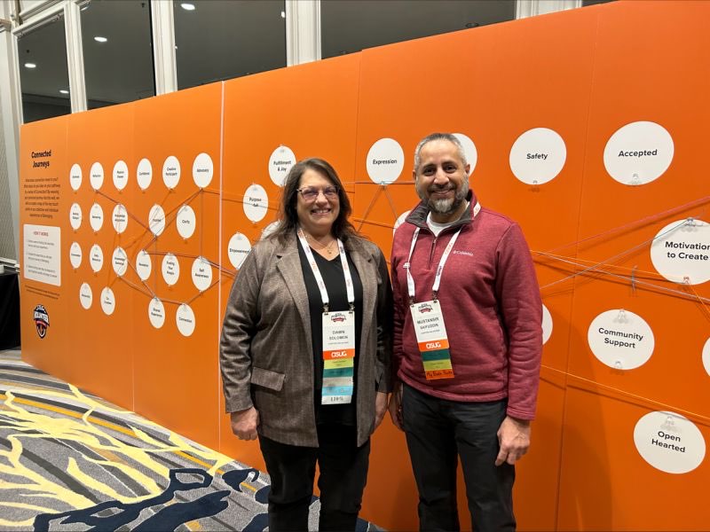 ASUG members Dawn Solomon and Mustansir Saifuddin.