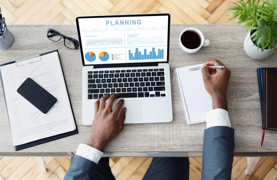 laptop with analytics planning dashboard